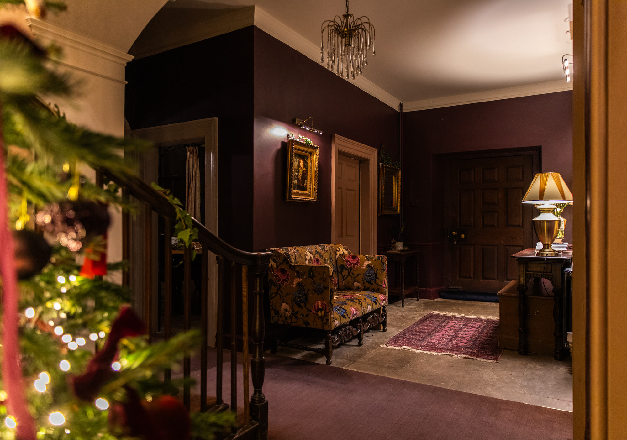 Welcoming hall seating with a Christmas tree in the foreground