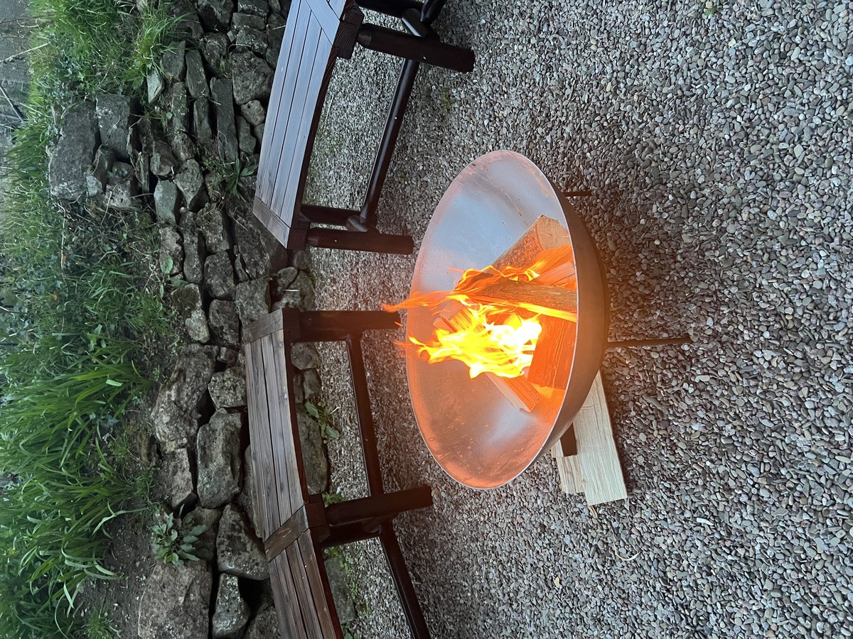 Evening fire pit in luxury house for group stays