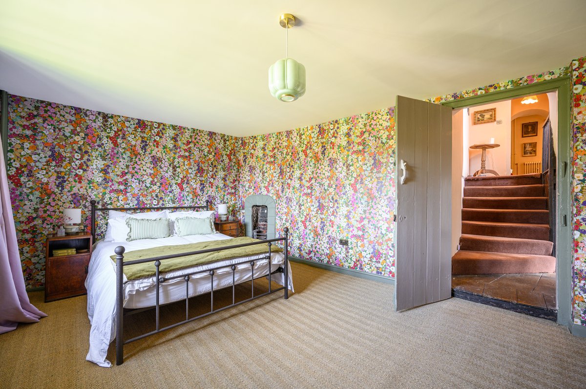 Bedroom with garden views in luxury group retreat
