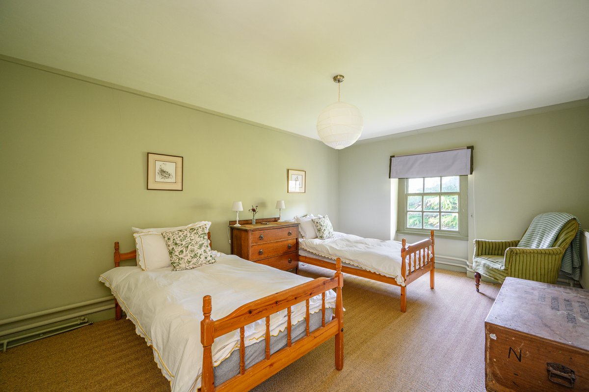 Twin bedroom in large family house for celebrations
